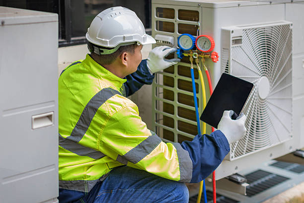 Professional Hvac technician working in Dover, NH